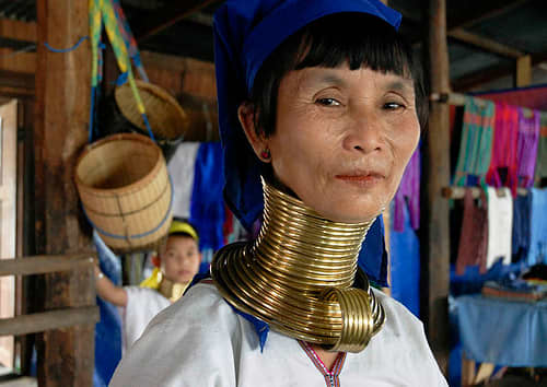 Women of the Padaung tribe use brass rings - up to 25 for an adult - to progressively stretch their necks. Rings are worn also on the calves. Image and desciption cortesy Hoorab - Flckr