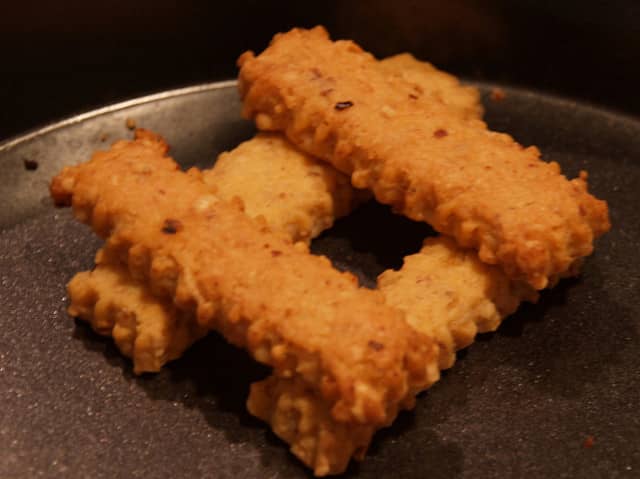 Cheese Straws can be made in various shapes. Everyone I know favors the star attachment on a cookie press. Photo from Flickr.com.