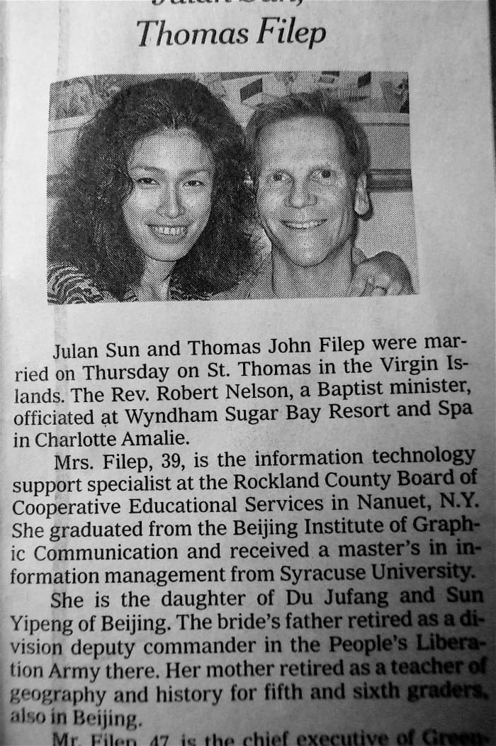 New York Times wedding announcement - notice the perfect alignment of the bride and groom's eyebrows!