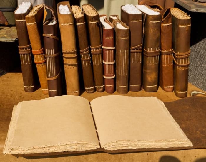 love the rough-edges paper and rustic styling of these books. The stitching techniques used are long stitching (in the center) combined with link stitches (at the ends).