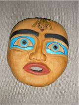 This is my very first carving, a simple flat mask I carved with teacher Mark George at Vancouver Night School. I was delighted with it at the time.It is very basic yet expressive.
