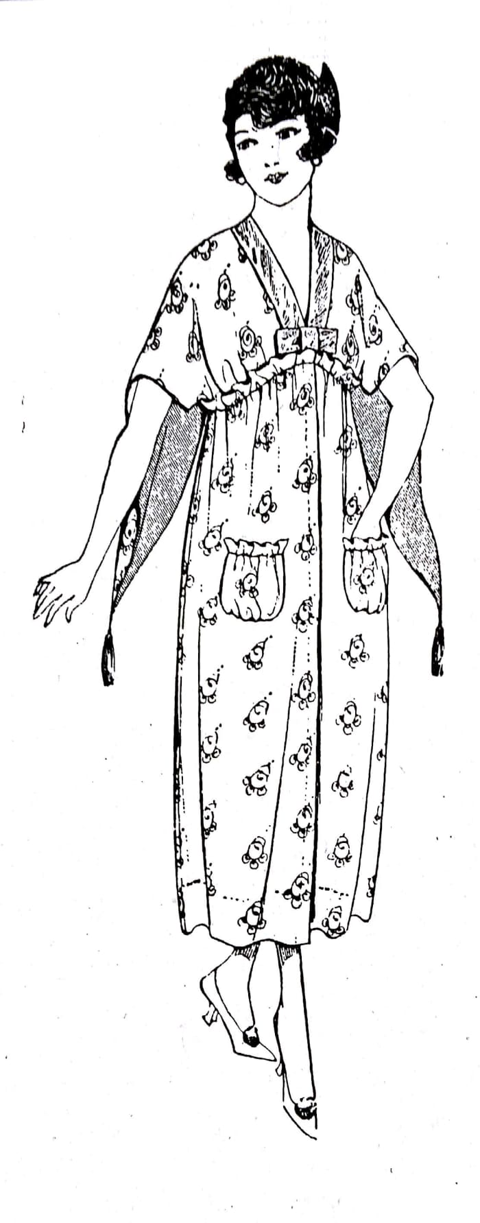 This is called a "bath-robe" in the 1917 book American Dressmaking Step by Step. It looks similar to the "wrappers" in the 1918 catalog above.