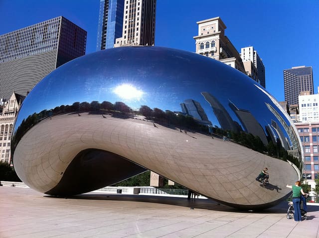 This stainless steel construction is by Indian-born British artist Anish Kapoor, and is the centerpiece of the AT&T Plaza in Millennium Park (Chicago, Illinois, United States). The sculpture is nicknamed "The Bean".