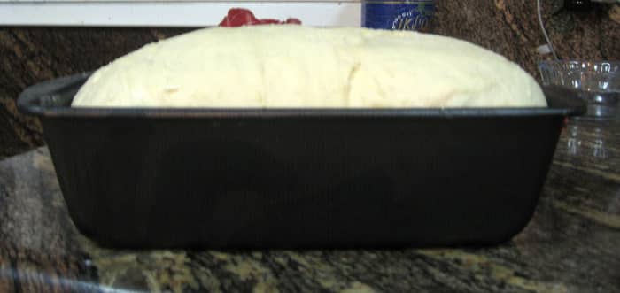After the bread dough has raised in the loaf pan, you are ready to pop it into a 400F pre-heated oven for 14 - 19 min. Don't forget the egg wash!