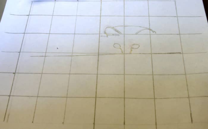 I used the grid on the reference photograph to guide where I should begin drawing the picture of Max.