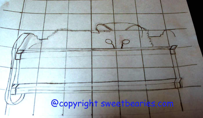 Here I am rounding out the bottom of Maxx's cradle, and changing other details on the sketch as I go along.