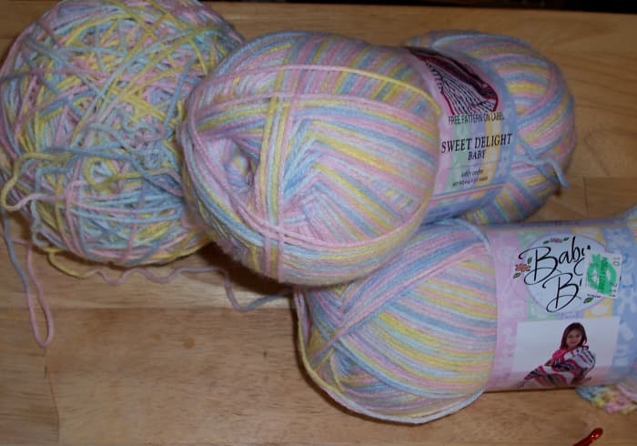 Using the right yarn allows you to make a lightweight baby afghan for use during warmer seasons.