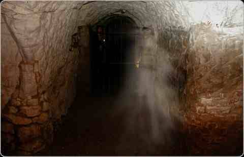 Can you see the ghost of the White Lady at The Hellfire Caves High Wycombe? Photo Nell Rose Postcard