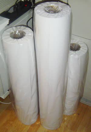 Rolls of bond paper. The tallest is 36". The advantage of a roll is that the printer can print a 24"x36" sheet, or a 240"x36" sheet, without changing paper. Not something you could do with blueline sheets, that came already cut.