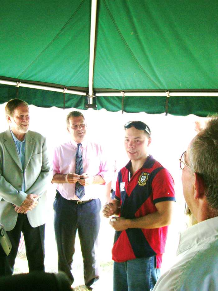 Under the tent at the Dedication for Shamus O'Brien are Mayor Philip A. Amicone, New York State Assemblyman Mike Spano and the great great grandson of Shamus O'Brien, John Hogan IV, an amateur boxer who lives in Yonkers.