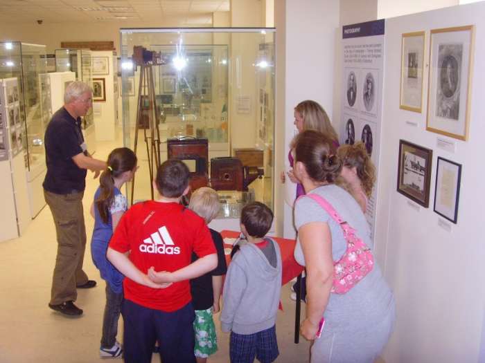The Sports Section of the County Waterford Museum in Dungarvan, Ireland, where "Yonkers Favorite" lightweight boxing champion Shamus O'Brien (born Michael J. Hogan) is remembered. His 1913 boxing poster can be seen on the far wall in this photograph.