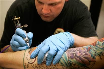 Tattoo artists make an average of $20,000 to $50,000 a year based on experience and the amount of work that's available.