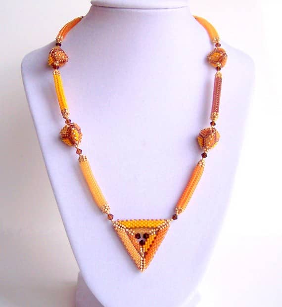 I included this example in one of my triangle hubs, but it was too perfect not to include it here, too. I love how she combines different beaded beads for this necklace.
