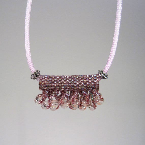 Purple Slide Necklace Peyote Tube: A beaded bead, with or without embellishment, can make a gorgeous focal for a necklace or bracelet.