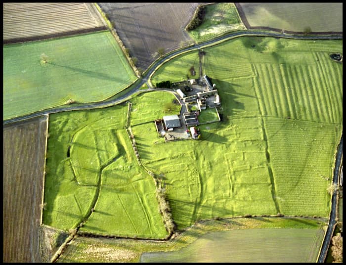 Ulnaby Hall Farm from the air, showing the 'imprints' of dwellings. The site was probably begun and occupied by Danes from across the River Tees after the 'Harrying of the North' by King William I in 1069.