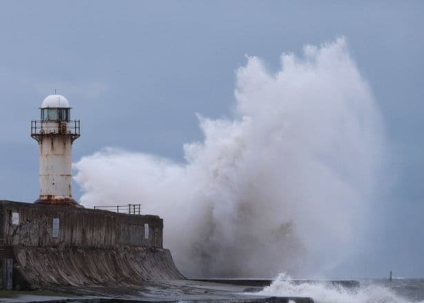 Winter weather in the Tees Bay - storm wave surges over the South Gare beacon in the recent past
