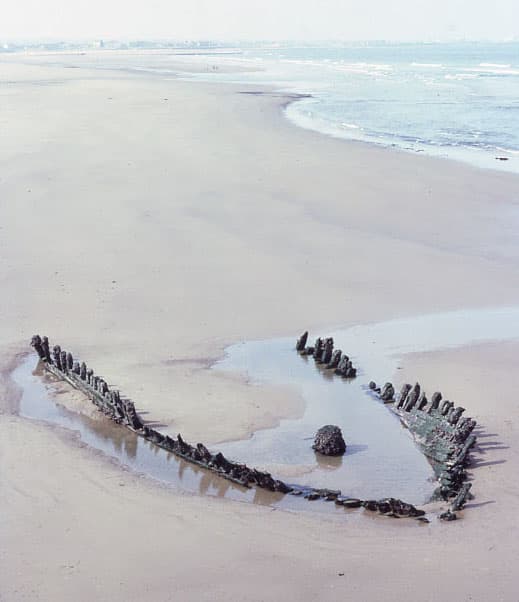 The wreck of the Danish schooner 'Doris' located 1983 near the South Gare, seen here at low tide. Shifting sands exposed the skeleton of the vessel.