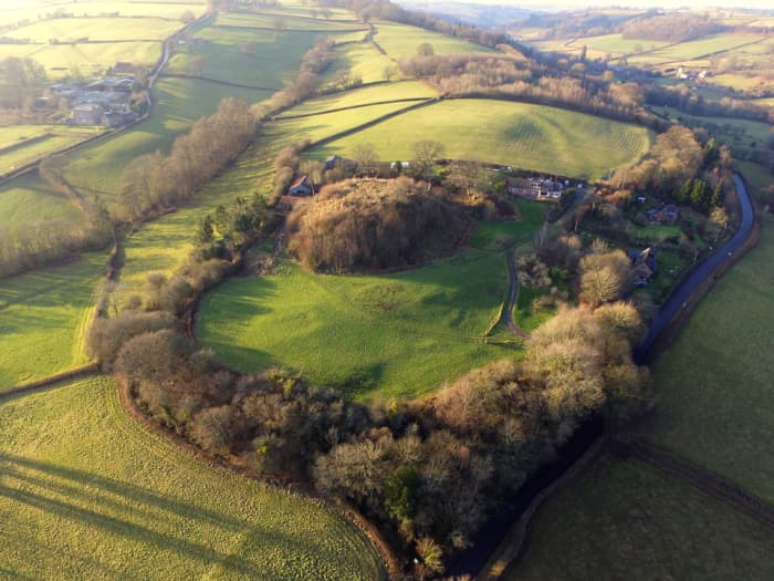 Aerial view of Ewyas Harold near the Herefordshire boundary. William fitzOsbern's motte is plain to see, ringed as it is by a 'curtain' of trees