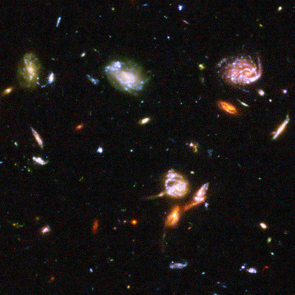 Part of the Hubble Ultra Deep Field. Even the brightest galaxies in this image have an apparent magnitude of 22. NASA, ESA, S. Beckwith (STScI) and the HUDF Team.