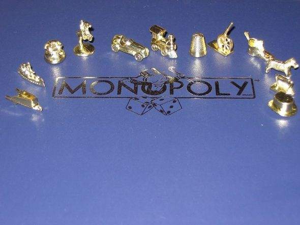 Deluxe Monopoly Tokens - People collect the playing tokens from different versions of the board game Monopoly.