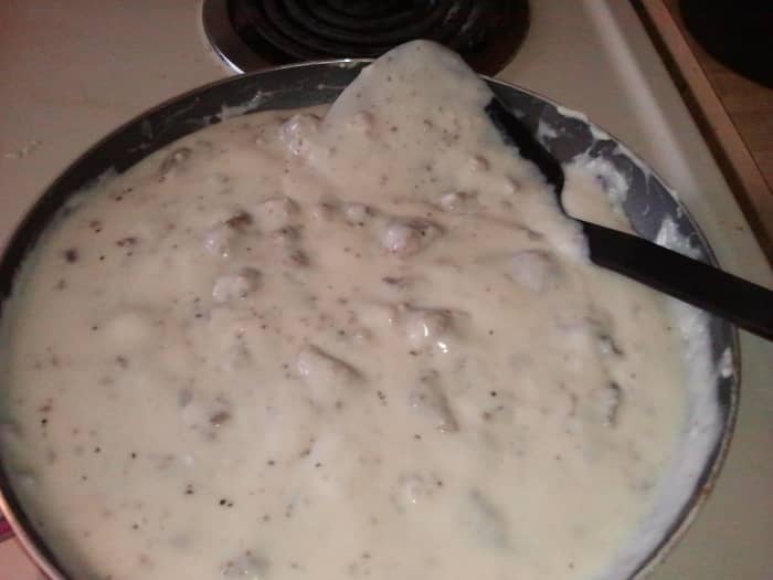 The finished gravy with the sausage added back in. See how it coats the spatula? PERFECT! I won't allow anything less from myself when it comes to gravy!