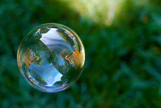 Full of life, vibrancy and color, a bubble transitions quickly before disappearing into thin air.