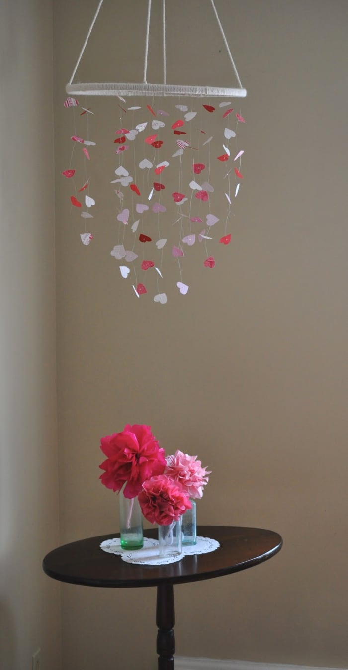 The heart shaped mobile shown here is just like the one I saw in the Pottery Barn catalog. Find out how to make this mobile yourself by visiting naptime notebook