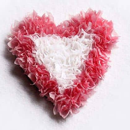 Construction paper and tissue squares are the basic ingredients you will need to make these puffy heart crafts. I found this idea on Spoonful.