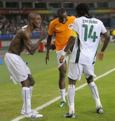 Solomon Kalou (L), Sekou Cisse (C) and Gervinho (R) celebrate for the Ivory Coast following a goal by Gervinho late in its match against Serbia in Shanghai on Aug. 10, 2008. The Ivory Coast won 4-2
