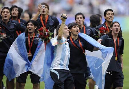 Argentina celebrates winning the gold medal at the 2008 Summer Olympics. The South American nation won gold for the second straight Olympic tournament in football.