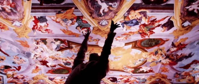 Above Jimin and J-Hope is the fresco on the ceiling in Ljubljana Cathedral painted by Giulio Quaglio the Younger.