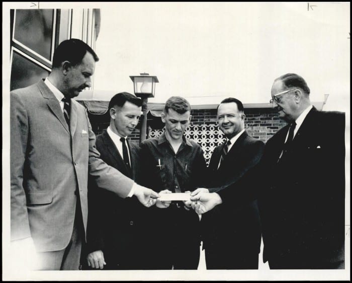 Poteau Airport officials received a check for $5,000 from the Oklahoma Aeronautical Commission for development of the new Poteau airport, which Robert S. Kerr helped to establish.