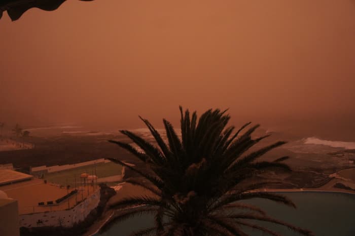 The Calima, a dust storm from the Sahara Desert, obscures everything at midday - a harbinger of the Pandemic that would embrace the world.