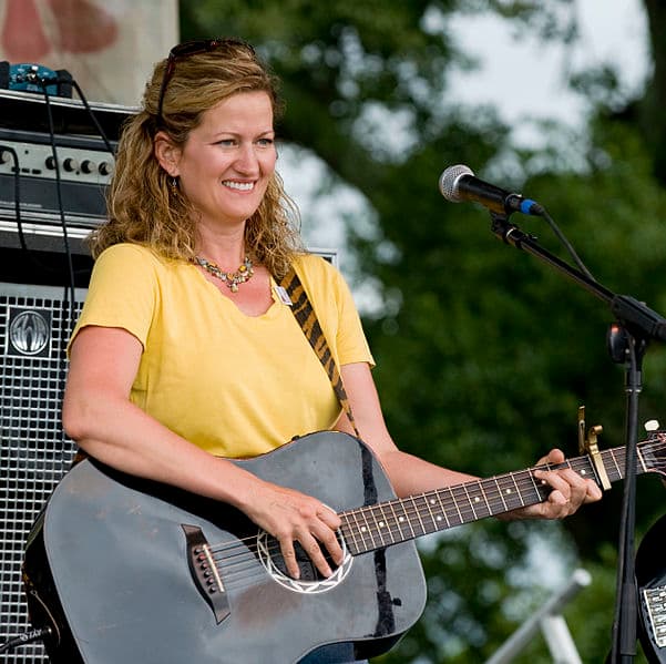 Christine Balfa playing the guitar at the 2009 Breaux Bridge Crawfish Festival.