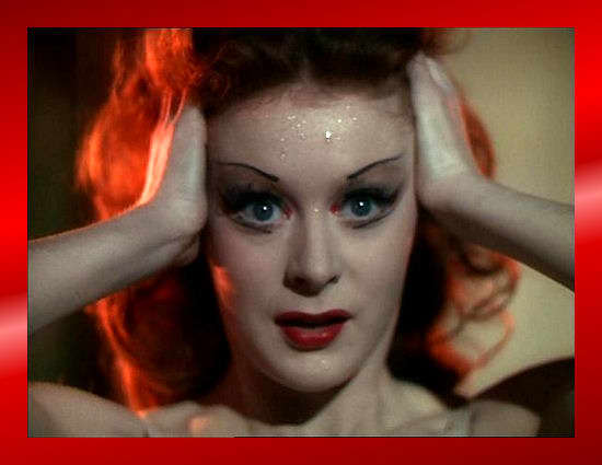 Her obsession is driving her mad. She sees Lermentov in the shoemaker's place. Is it performance, or is it reality?