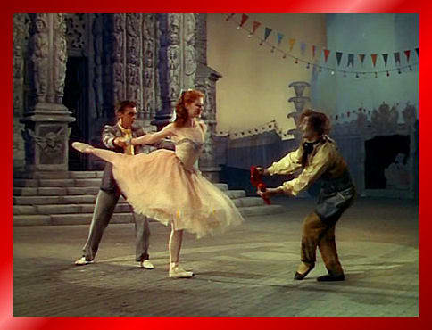 The shoemaker entices her every-which-way-but-loose! The shoes glow, he "dances" them, he polishes them They're irresistible!