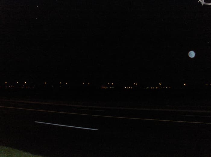 The entire photo of the picture at the front of this Hub...taken in the dark...there are lights and traffic...but in the next phot taken at approximately the same location...no orb! copyright by Scribenet