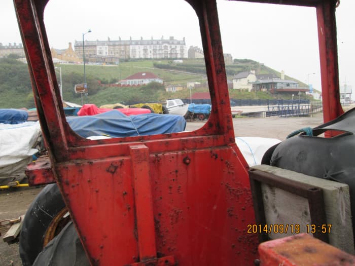 Saltburn, the Victorian S&DR town established by Edward Pease, seen through a tractor cab by Old Saltburn