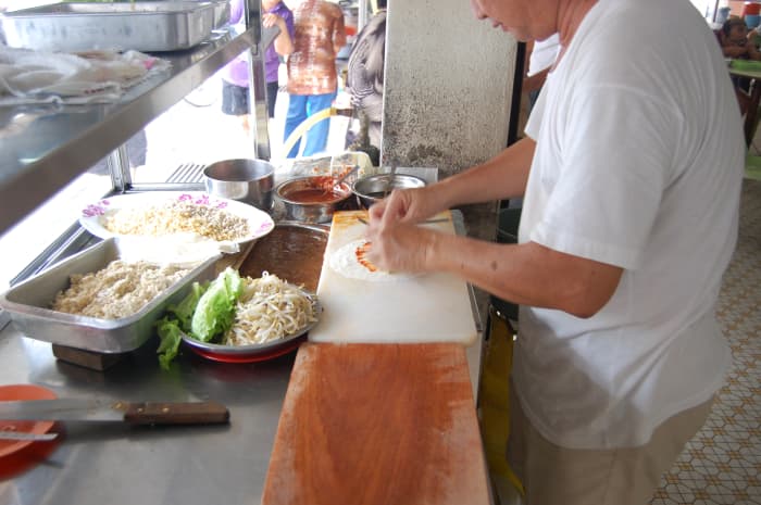 Fresh spring rolls or popiah is a popular food found in most coffee shops or eating places in Malaysia and Singapore.