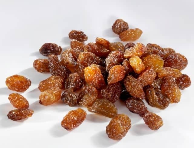 A cup of raisins contains 10g of dietary fiber. Dietary fiber is essential in the body for regulating bowel movement, thereby preventing constipation.