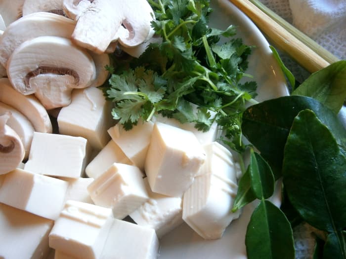 Cubed soft tofu, sliced button mushroom, cilatnro and kaffir leaves make up the rest of the fresh ingredients..