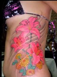 The bright colors in this hibiscus tattoo truly sets the tone for this beautiful hibiscus tattoo design.