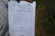 Sobongiseni Ngcobo show Corruption Watch the "happy letter" he signed confirming the number 2549 is his house - but someone else is living in it