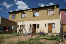 A remodeled hostel turned into a double-storey flat. The contractor reused old roof which are now falling off