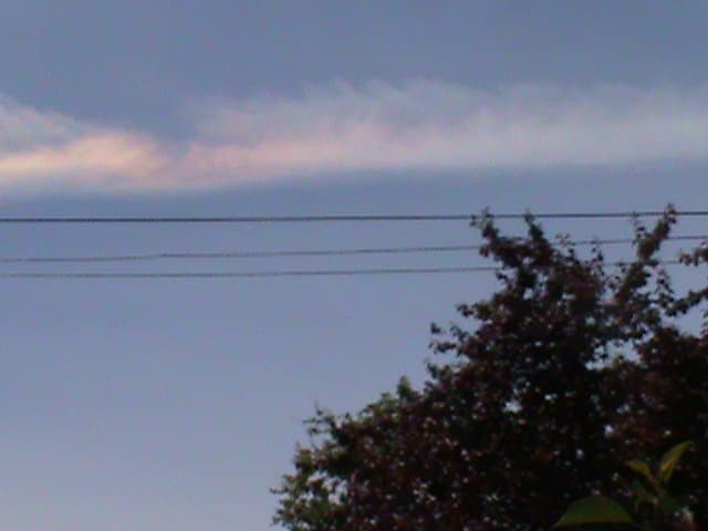 This chembow was photographed over Vancouver just before a sun halo materialized. The two are separate occurrences.