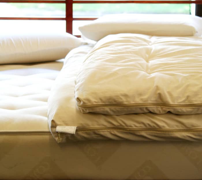 Example of a plush but firm mattress - ideal for adding additional comfort with any topper. Image Copyright: Misfit Chick