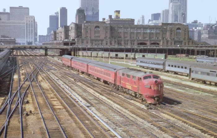 The Pug as the one round trip 3 car train from Joliet was known, heads out of Union station.