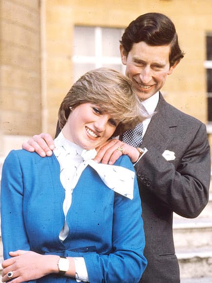 First photograph after engagement announcement, Prince Charles, age 32, with his fiancée, Lady Diana Spencer, 19, outside Buckingham Palace - Feb. 24, 1981