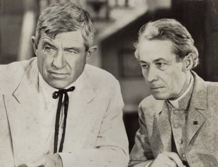 A 1934 publicity still for the movie, Judge Priest. Will Rogers (left) and Henry B. Walthall.