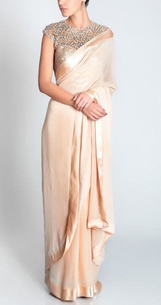With Beautiful simple no embellishment saree or with minimal designs, this type of gorgeous eyecatching sarie blouse looks very sophisticated.